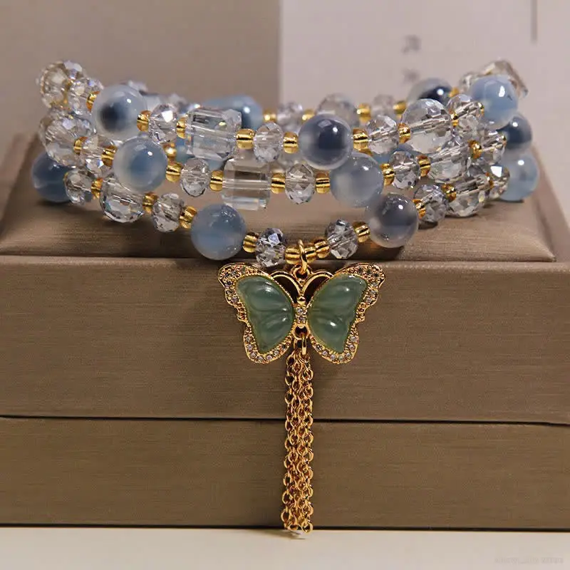 Blue Agate Butterfly Bracelet photographed on a neutral background